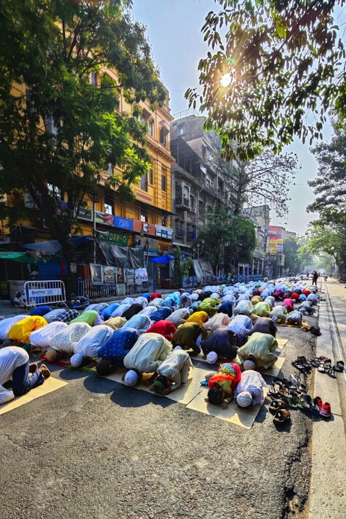 a group of people laying on the side of a road