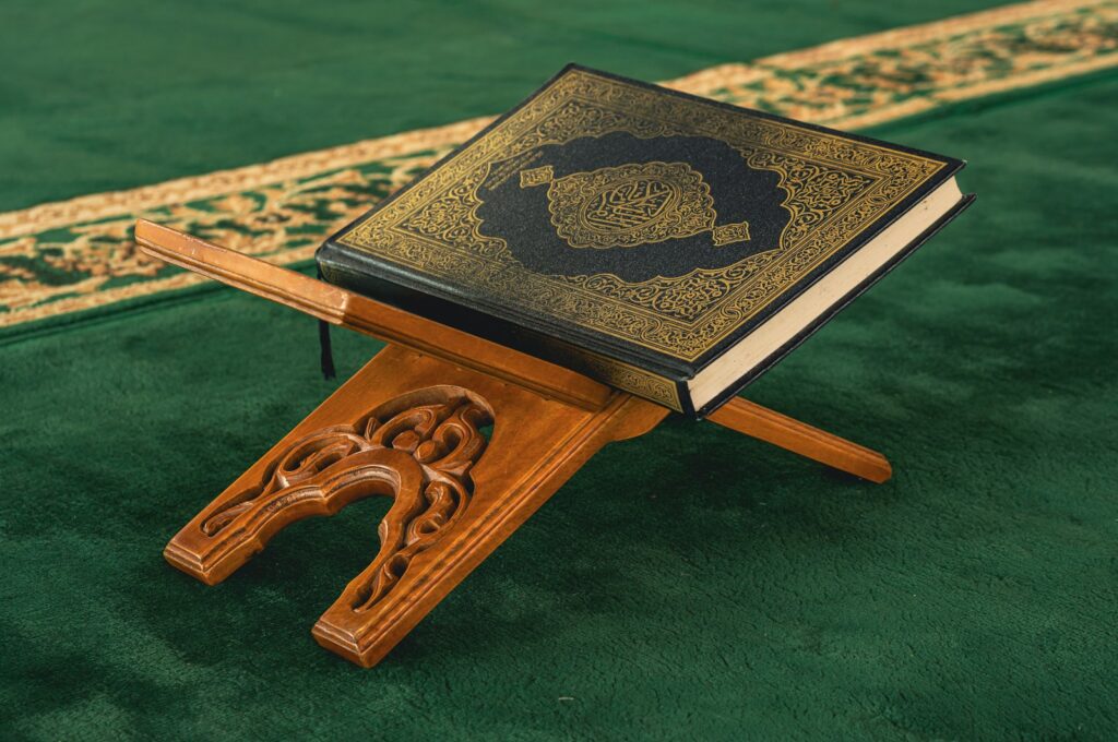 A wooden stand with a book on top of it